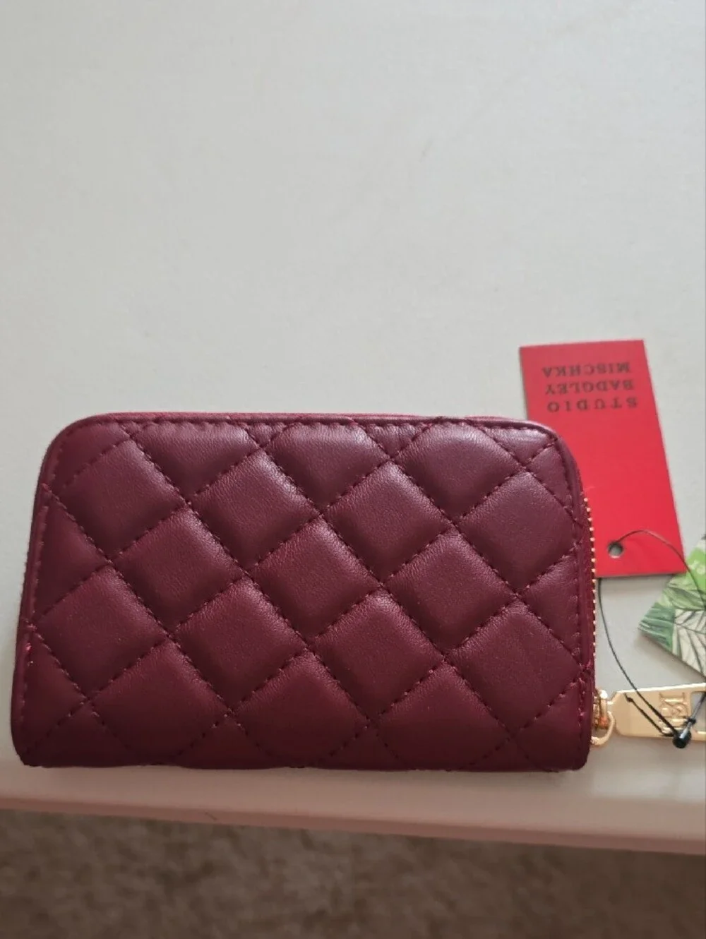 Badgley Mischka Quilted Wine Zip Card Wallet with Gold Logo